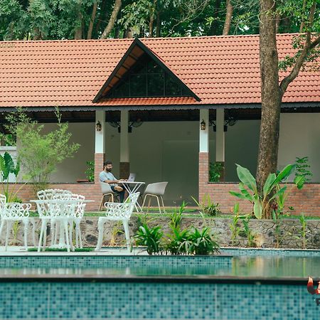 Hotel Athirapilly On The Rocks à Athirappilly Extérieur photo
