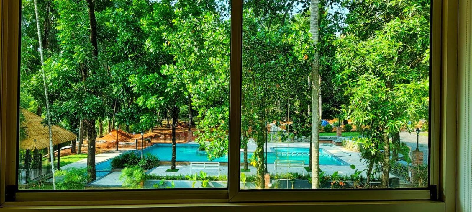 Hotel Athirapilly On The Rocks à Athirappilly Extérieur photo
