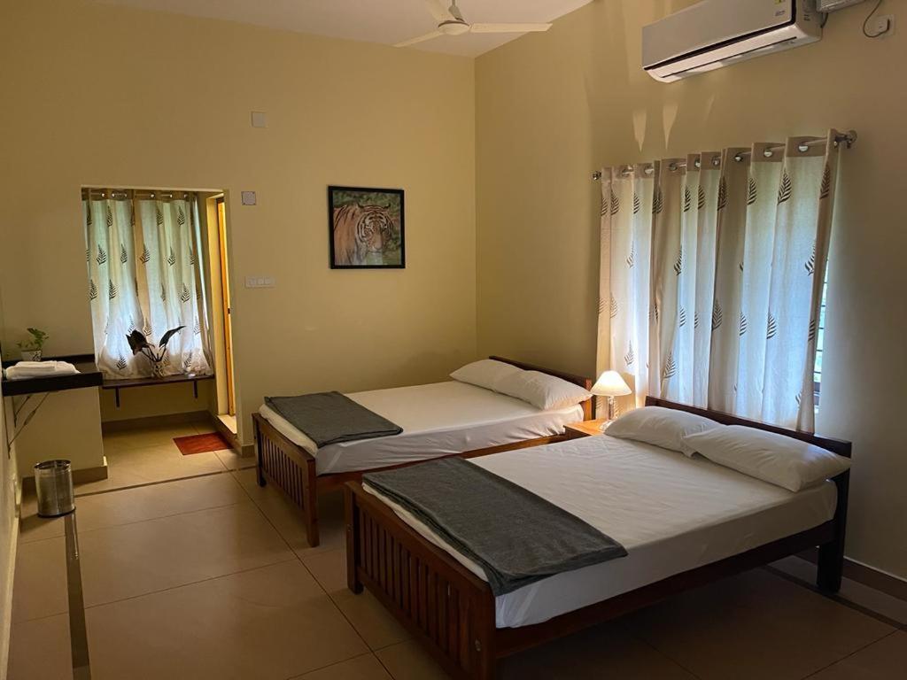 Hotel Athirapilly On The Rocks à Athirappilly Chambre photo